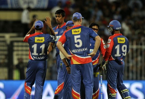 Delhi Daredevils players celebrate after picking up a wicket