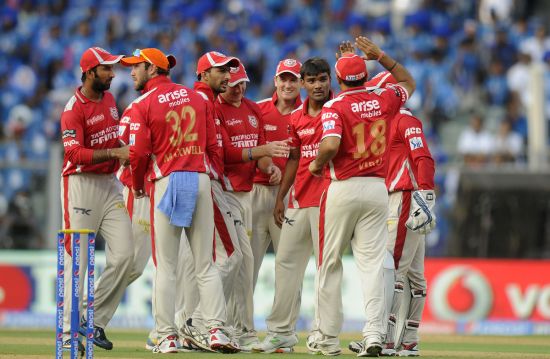 Kings XI Punjab players celebrate after picking up a wicket