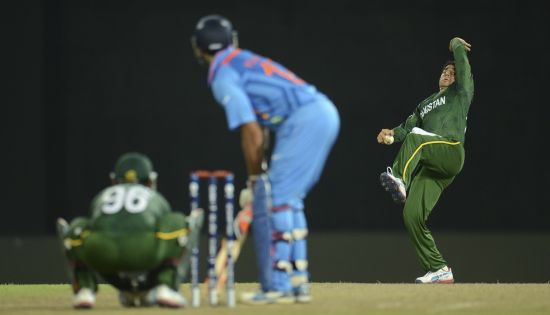 Saeed Ajmal bowls to Yuvraj Singh