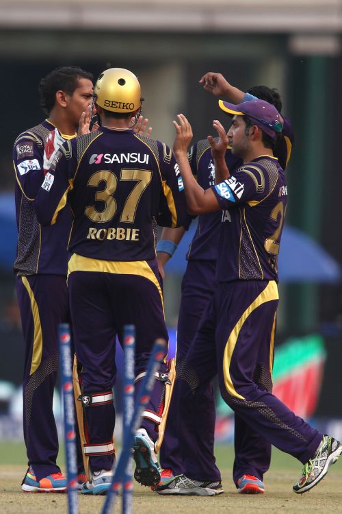 Gautam Gambhir celebrates after a fall of a wicket