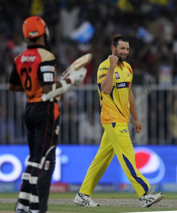 Ben Hilfenhaus celebrates after dismissing Shikhar Dhawan