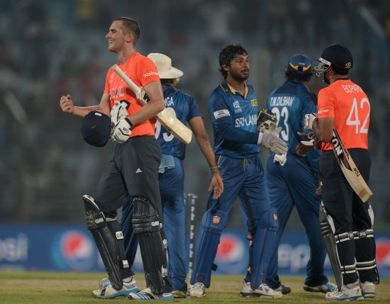 Alex Hales celebrates after winning the game for England