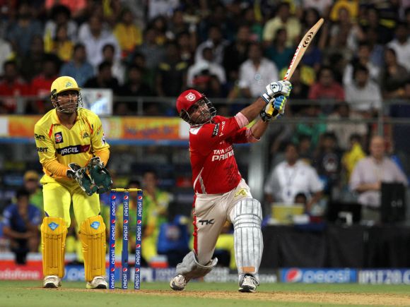 Virender Sehwag hits a six.