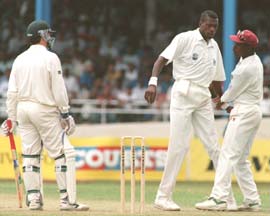 Richardson (right) intervenes the confrontation between Waugh (left) and Ambrose