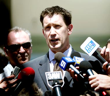 James Sutherland addresses reporters at the MCG