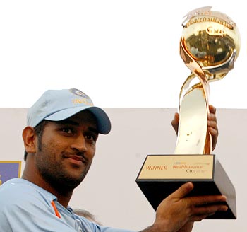 Dhoni poses with the trophy after India beat Sri Lanka 4-1 in the five-match ODI series