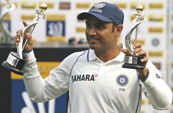 Sehwag with the man-of-the-match and man-of-the-series awards after the presentation ceremony