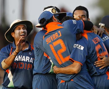 Indian team celebrates winning the first ODI