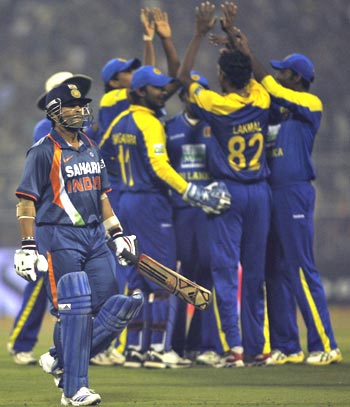 Sri Lankans celebrate Sachin Tendulkar's wicket