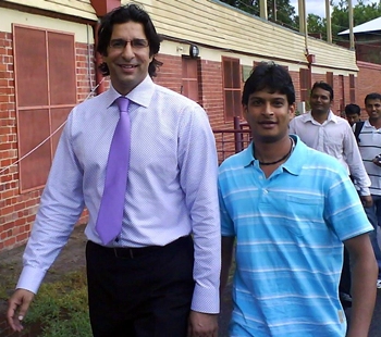 Wasim Akram (left)