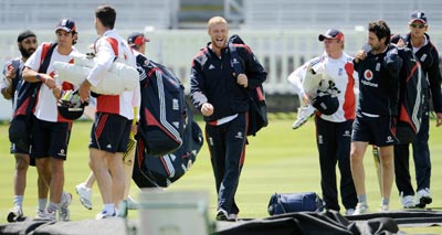 England's Andrew Flintoff (centre) and teammates head to the net area during a training session prior to the second Ashes Test against Australia at Lord's