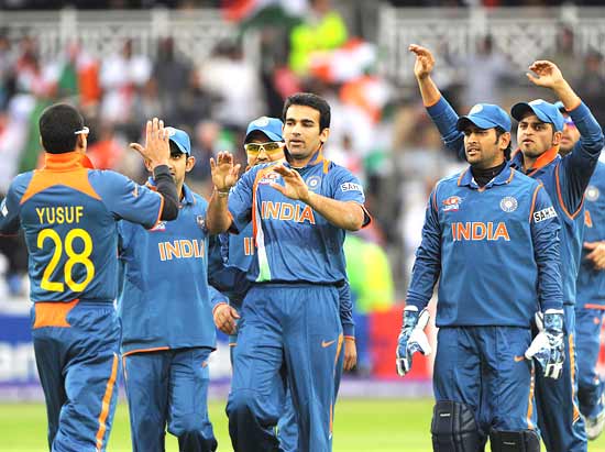 Zaheer Khan is congratulated by his teammates