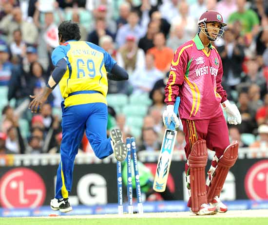 Angelo Mathews celebrates after bowling Lendl Simmons for a duck
