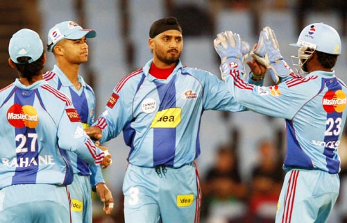 Harbhajan Singh celebrates with team-mates