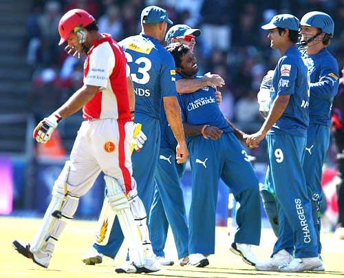 Yuvraj Singh walks back to the pavillion after being cleaned bowled by Venugopal Rao