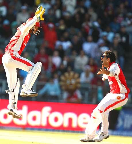 Sangakkara and Yuvraj exult after the dismissal of Symonds