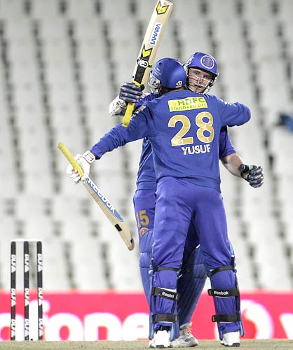 Yusuf Pathan and Graeme Smith celebrate their victory