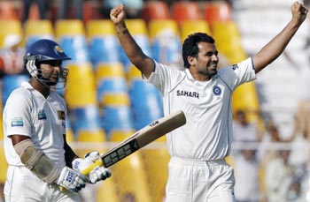 India's Zaheer Khan celebrates taking wicket of Sri Lanka's captain Kumar Sangakkara