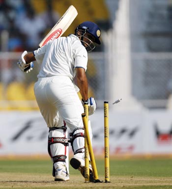 India's Rahul Dravid is bowled during first test match against Sri Lanka in Ahmedabad