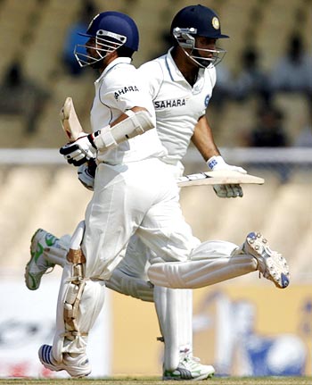 Sachin Tendulkar (left) and VVS Laxman run between the wickets