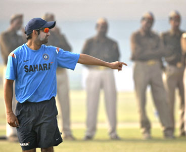 Gautam Gambhir goes through the paces during training amid tight security on Monday
