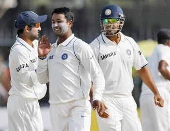 India's players celebrate after they won their second test cricket match against Sri Lanka in Kanpur