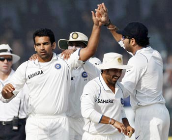 India's Zaheer Khan celebrates taking wicket of Sri Lanka's Angelo Mathews in Kanpur