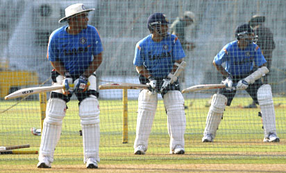 Virender Sehwag, Sachin Tendulkar and Rahul Dravid bat in the nets on Monday
