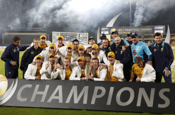 Members of the Australian cricket team celebrates victory in the ICC Champions Trophy after defeating New Zealand