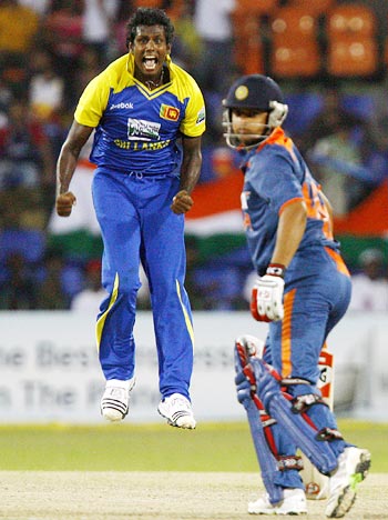 Angelo Mathews celebrates the wicket of Suresh Raina