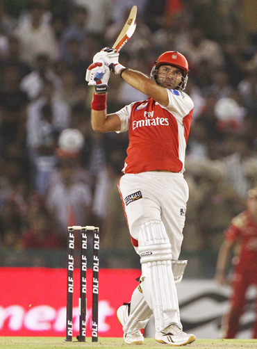 -Yuvraj Singh of the Kings XI Punjab hits a ball for six