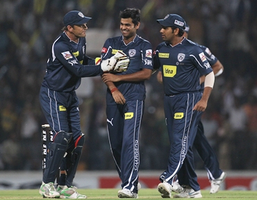 R P Singh is congratulated by teammates