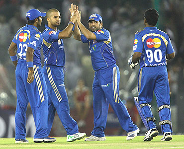 J P Duminy and Sachin Tendulkar celebrate the wicket of Adrian Barath