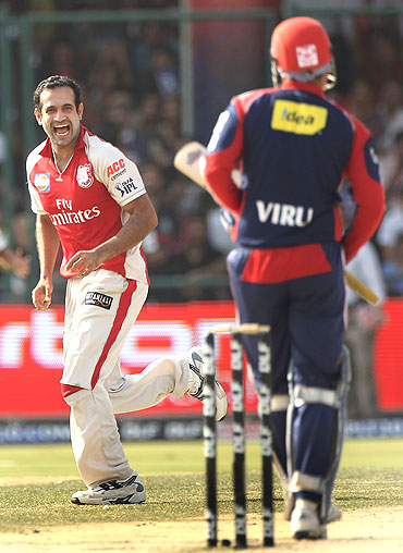 Irfan Pathan celebrates the wicket of Virender Sehwag