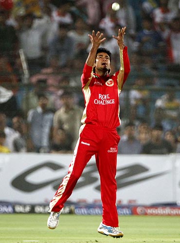 Manish Pandey is jubilant after taking the catch to dismiss Naman Ojha