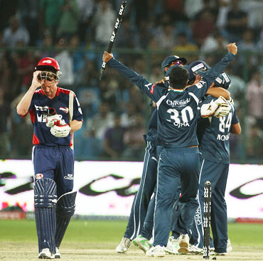 Deccan players celebrate after winning the match