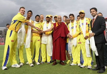 Dalai Lama with the Chennai Super Kings players