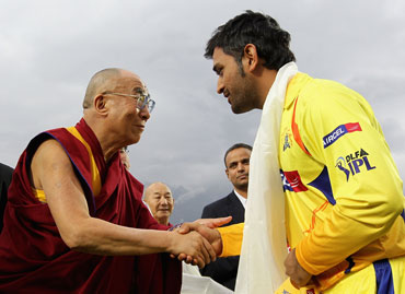 Dalai Lama presents Khata to MS Dhoni