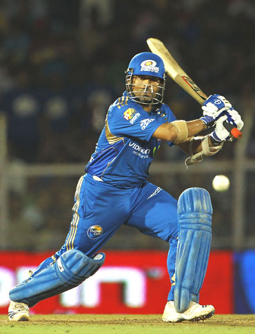 Tendulkar plays a shot against the Royal Challengers Bangalore in the IPL