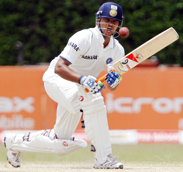 India's Suresh Raina plays a shot during the third day of their third and final test cricket match against Sri Lanka in Colombo