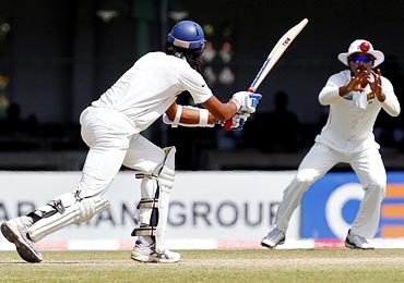 Kumar Sangakkara (right) takes a catch to dismiss Ishant Sharma