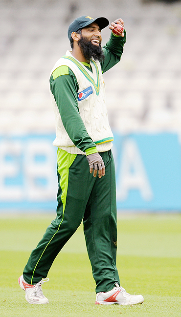 Mohammad Yousuf laughs during a practice session