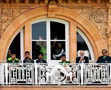 Pakistan cricket team watch from the dressing room during day four of the fourth Test against England at Lord's on Sunday.