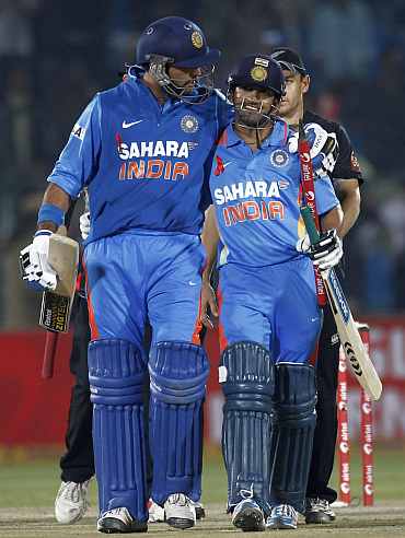 Yuvraj Singh and Gautam Gambhir celebrate after winning the second ODI against New Zealand in Jaipur