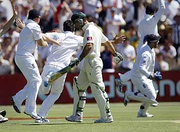 Australia's Ricky Ponting walks back to the pavilion after being dismissed by Anderson