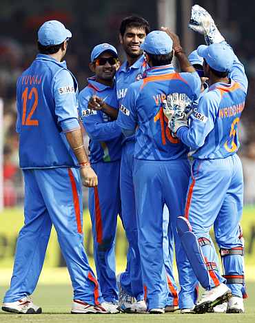 Indian players celebrate after picking up a wicket against New Zealand