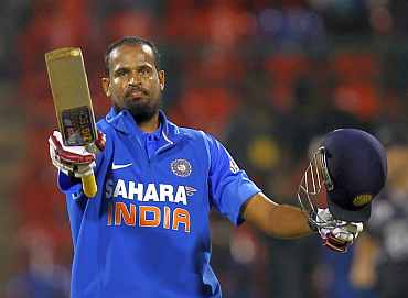 Yusuf Pathan celebrates after his century in Bangalore
