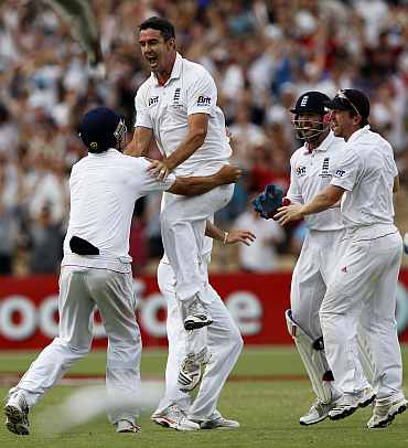 Kevin Pietersen celebrates after pickig up a wicket
