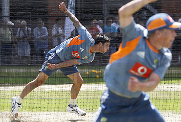 Mitchell Johnson bowls in the nets during a training session