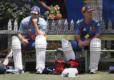 Mitchell Johnson sits next to Ricky Ponting after batting practice in the nets in Perth ahead of the third Ashes Test